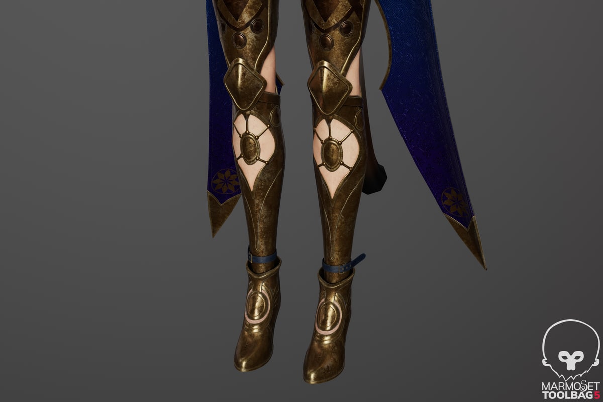 Close-up of Cipher's engraved gold boots and blue patterned fabric